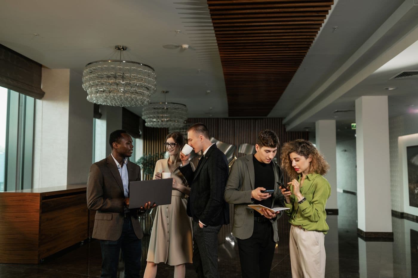 Diverse business professionals collaborating in a modern corporate office